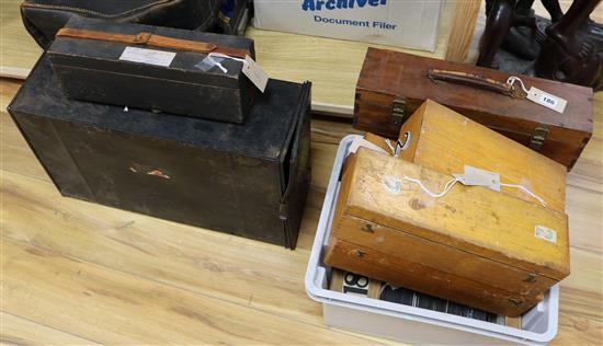 A collection of over 600 cased glass slides and negatives, many of old Chislehurst and a cased tinplate magic lantern (lacking burner)